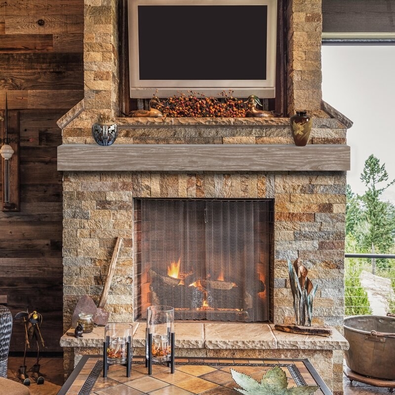 A pinewood hanging board that can be used as a wooden shelf or as a wooden mantle over a fireplace