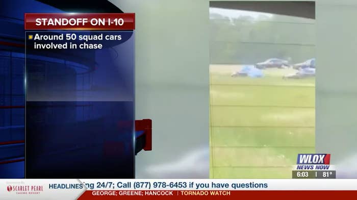 A caption in a news broadcast reads &quot;Standoff on I-10, around 50 squad cars involved in chase&quot;