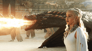 A dragon and Daenerys Targaryen in Game of Thrones