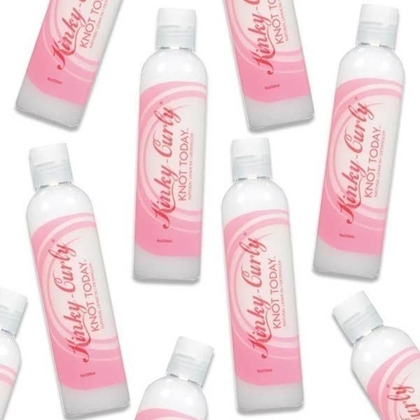 Bottles of Kinky Curly against solid white background