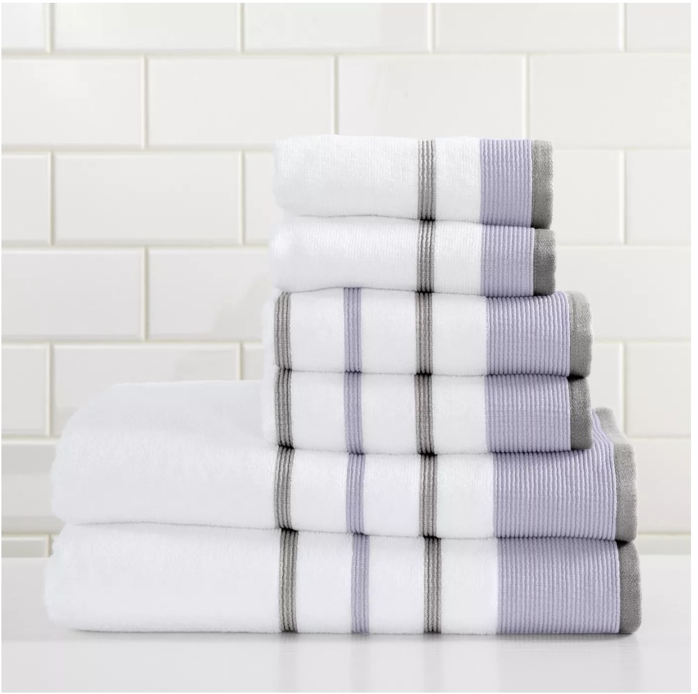A 100% cotton, 6-piece striped white, gray, and lavender towel set 