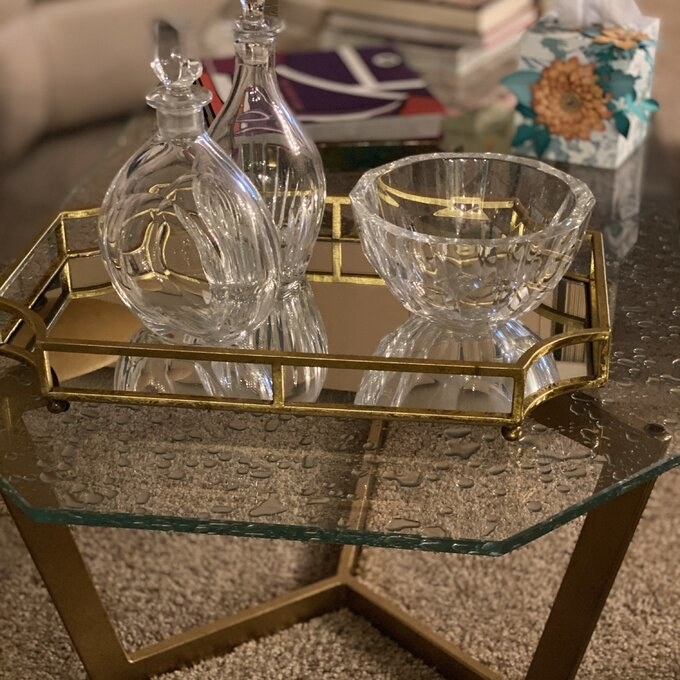 Rectangular tray with mirror bottom and metal golden metal exterior