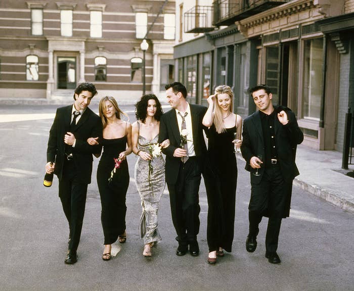 David Schwimmer, Jennifer Aniston, Courteney Cox, Matthew Perry, Lisa Kudrow, and Matt LeBlanc walking arm in arm for the &quot;Friends&quot; Season 6 promo