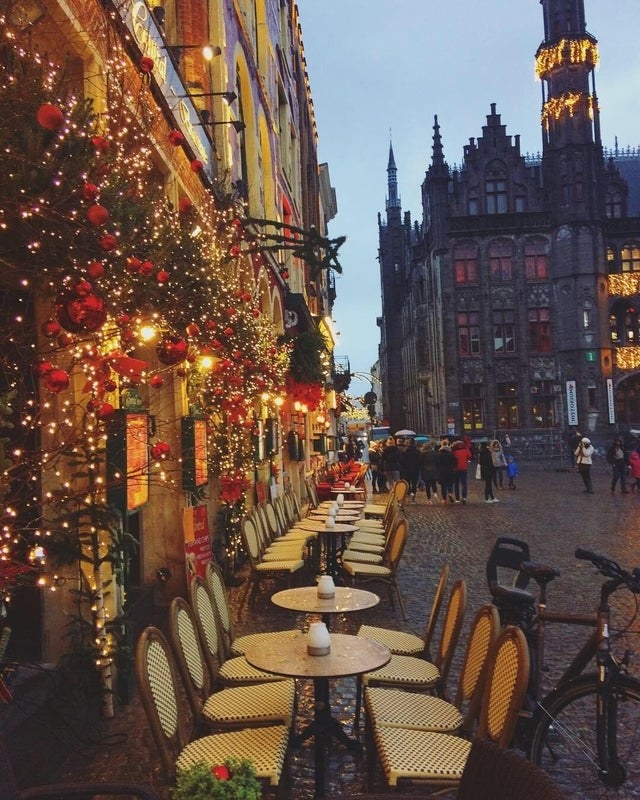 Christmas lights outside of a restaurant in Bruges