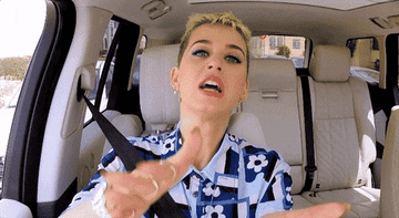 Katy Perry on Carpool Karaoke clapping her hands, saying: &quot;She keeps receipts&quot;