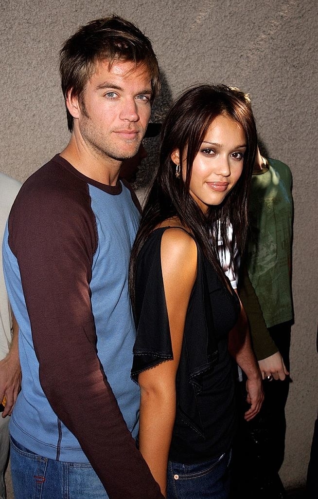 Michael Weatherly and Jessica Alba holding hands