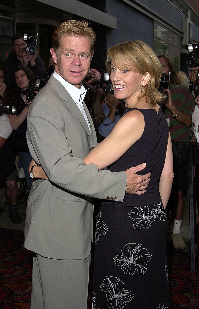 William H. Macy and Felicity Huffman on a red carpet hugging it out