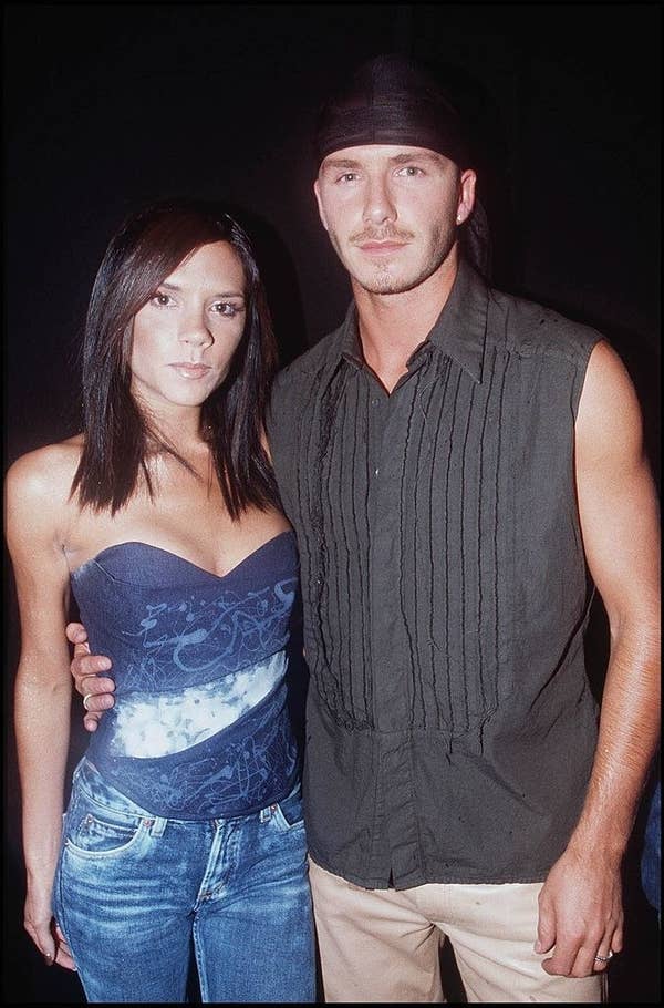 Victoria and David Beckham embracing inthe early 2000s