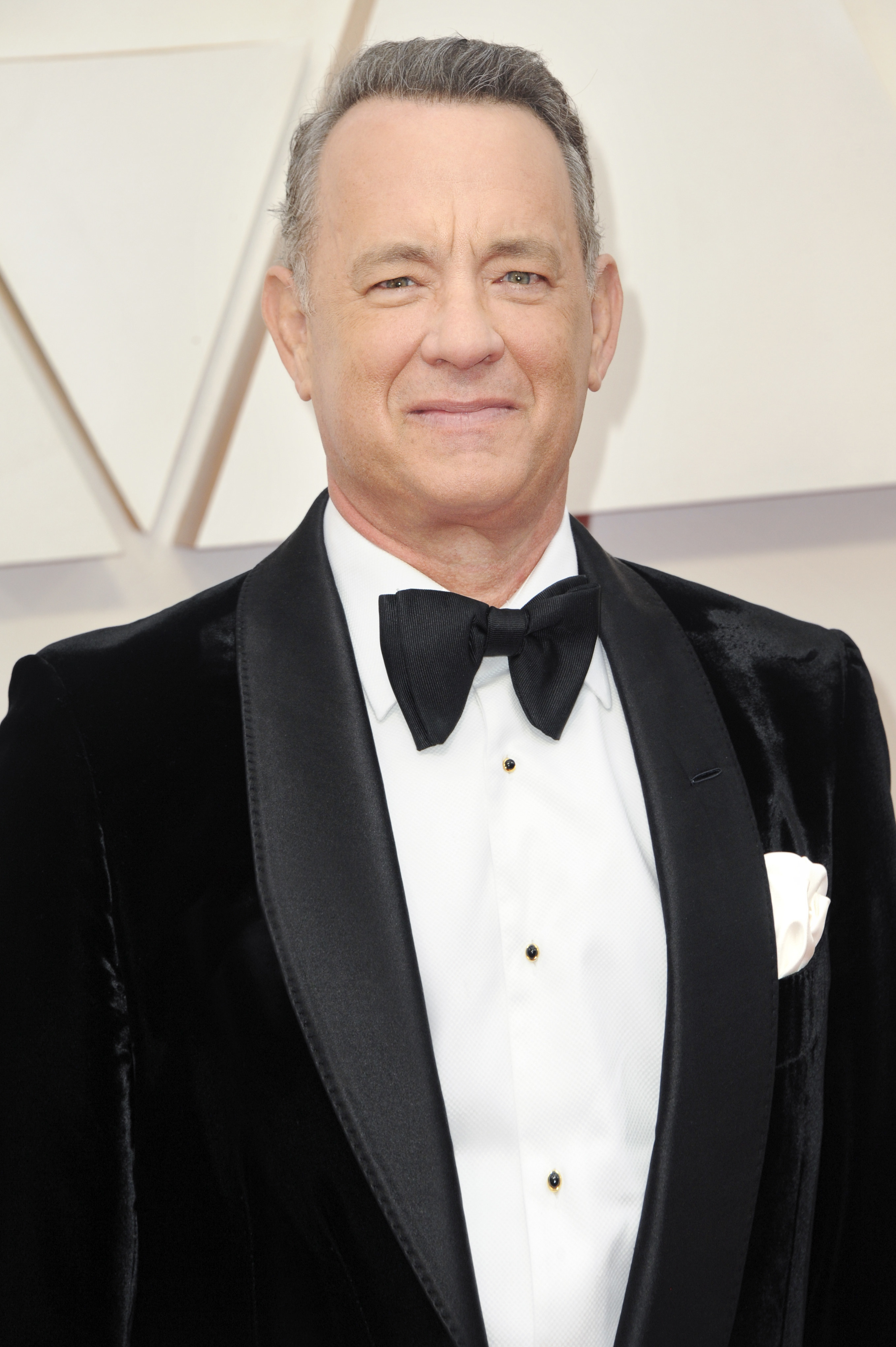 Photo of Tom Hanks in a dressy suit and bow-tie