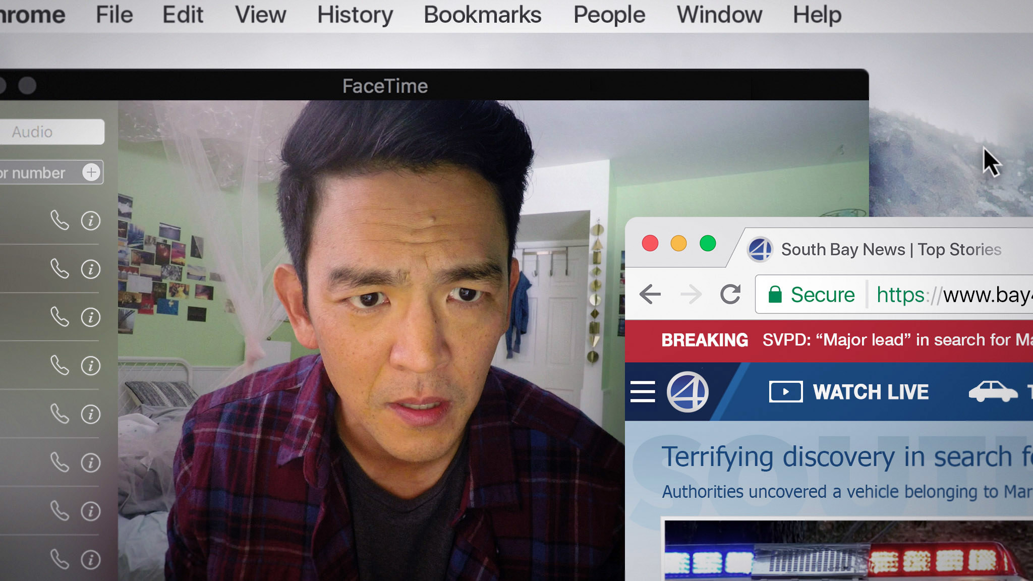 John Cho on a computer screen looking stressed out