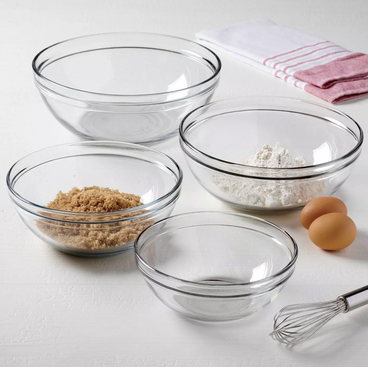 Clear bowls with baking ingredients in them