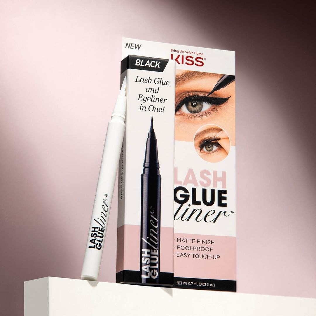 Kiss lash glue liner product leaning against its product box
