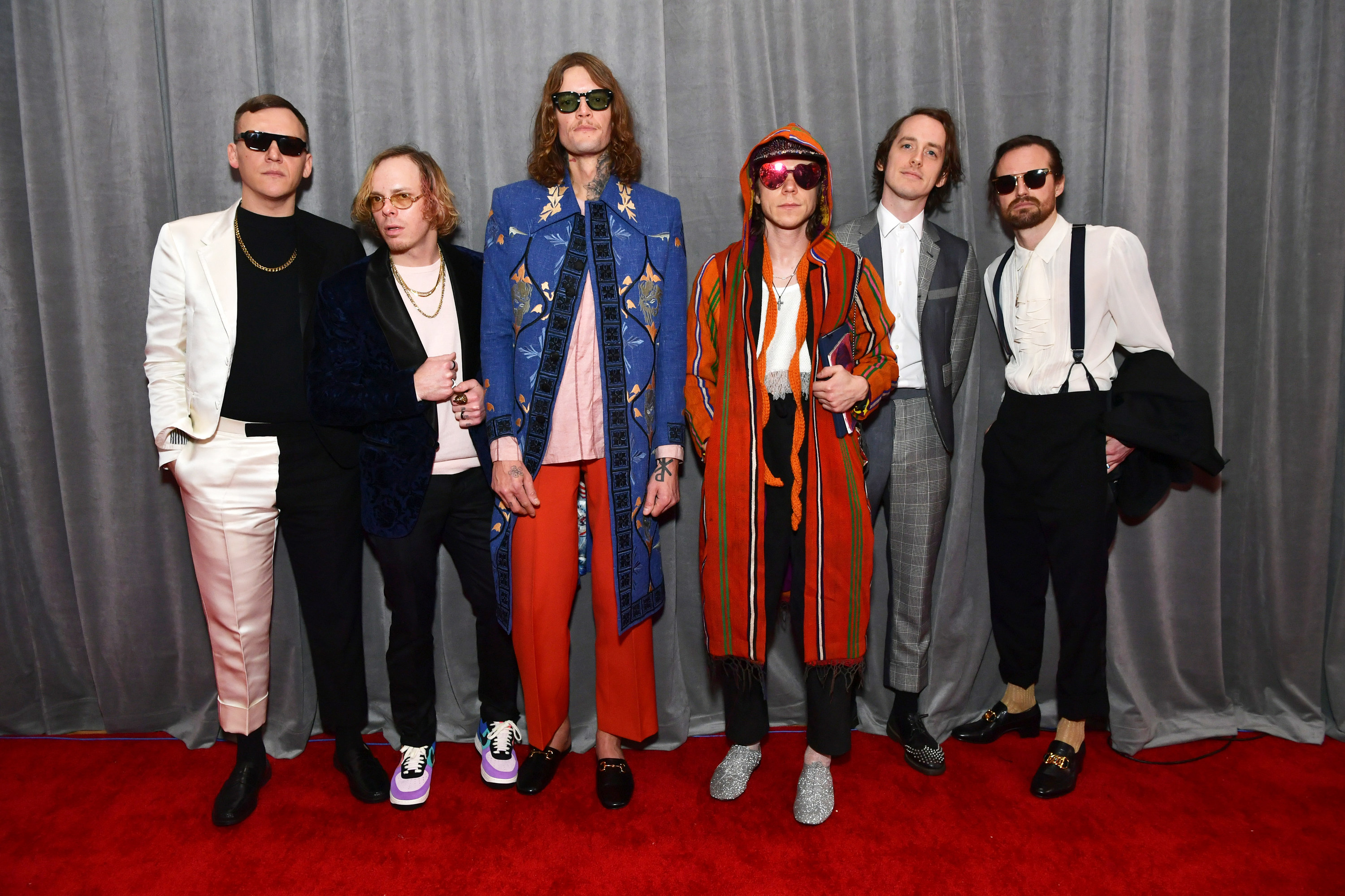 Photo of Cage the Elephant band members at a red carpet event