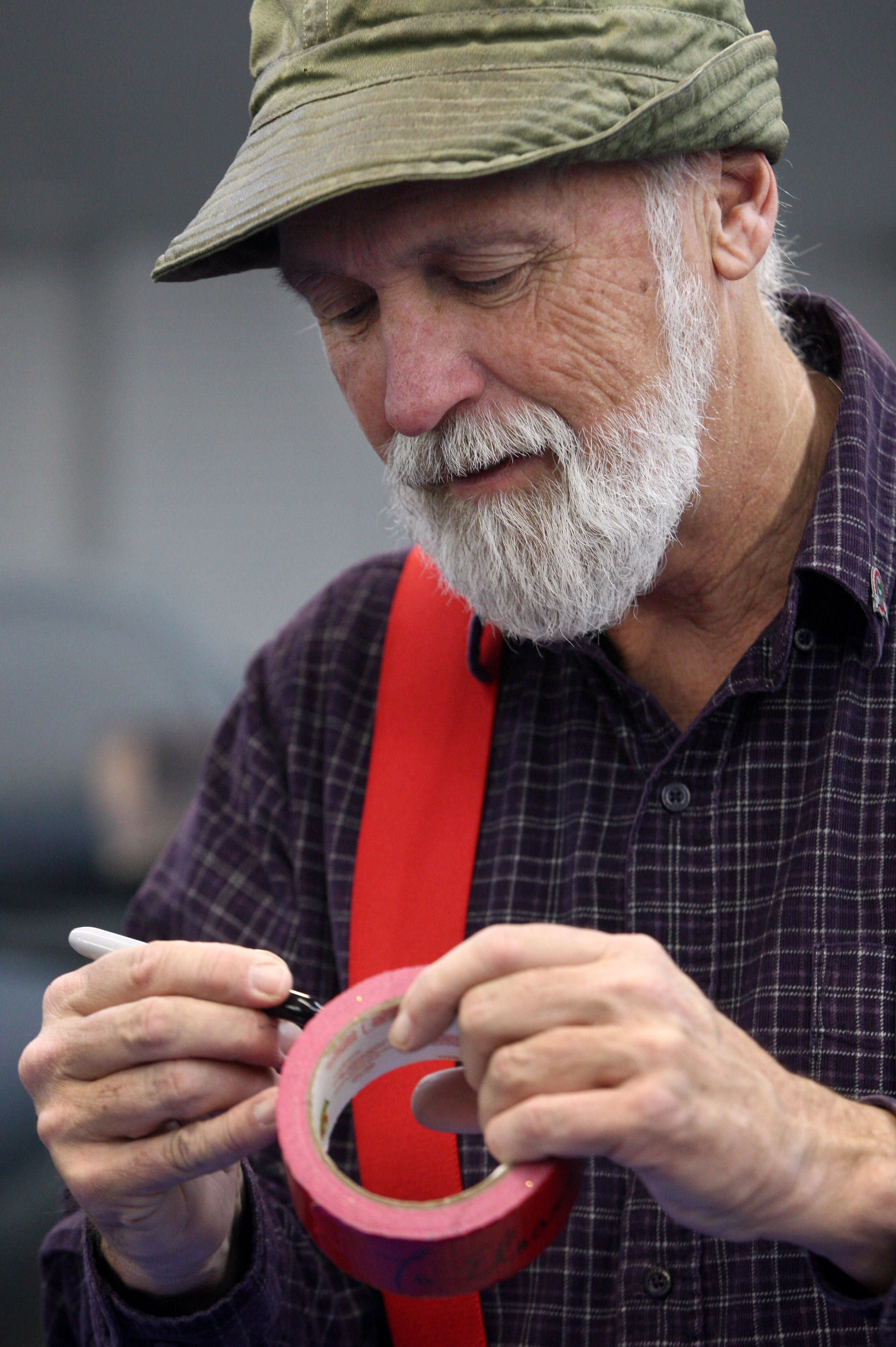 Steve Smith aka Red Green holding red duct tape 