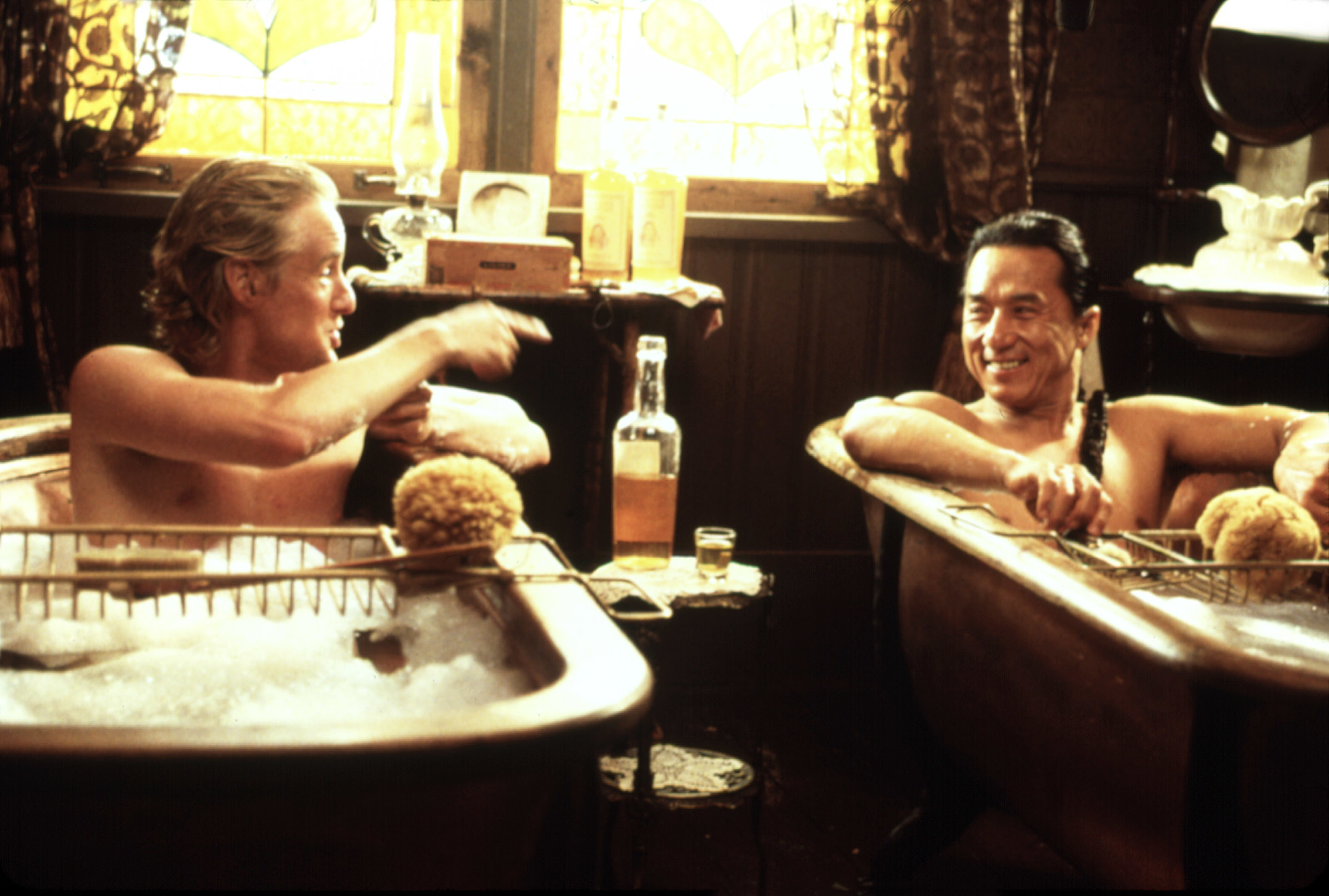 owen wilson and jackie chan drinking in a pair of bathtubs