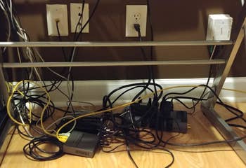 Reviewer's tangled cords under desk