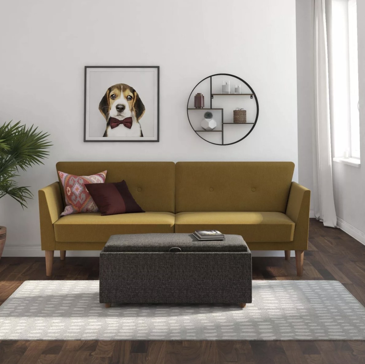 A mustard-colored futon in a modern living room