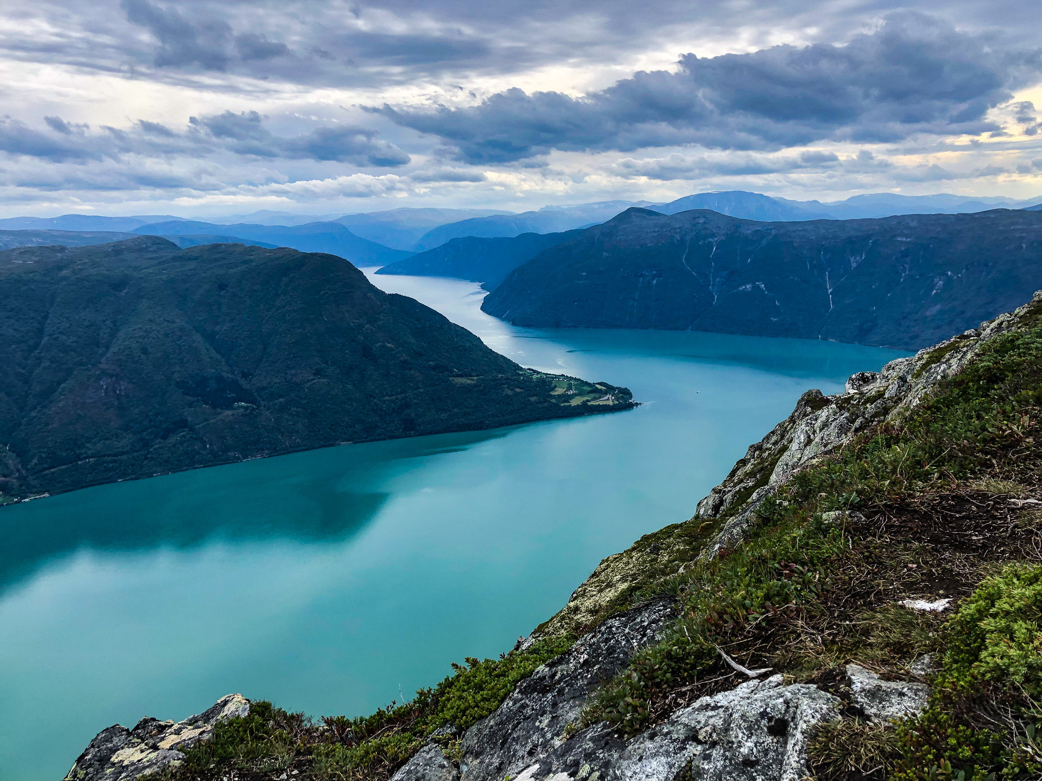 A beautiful body of water against mountains