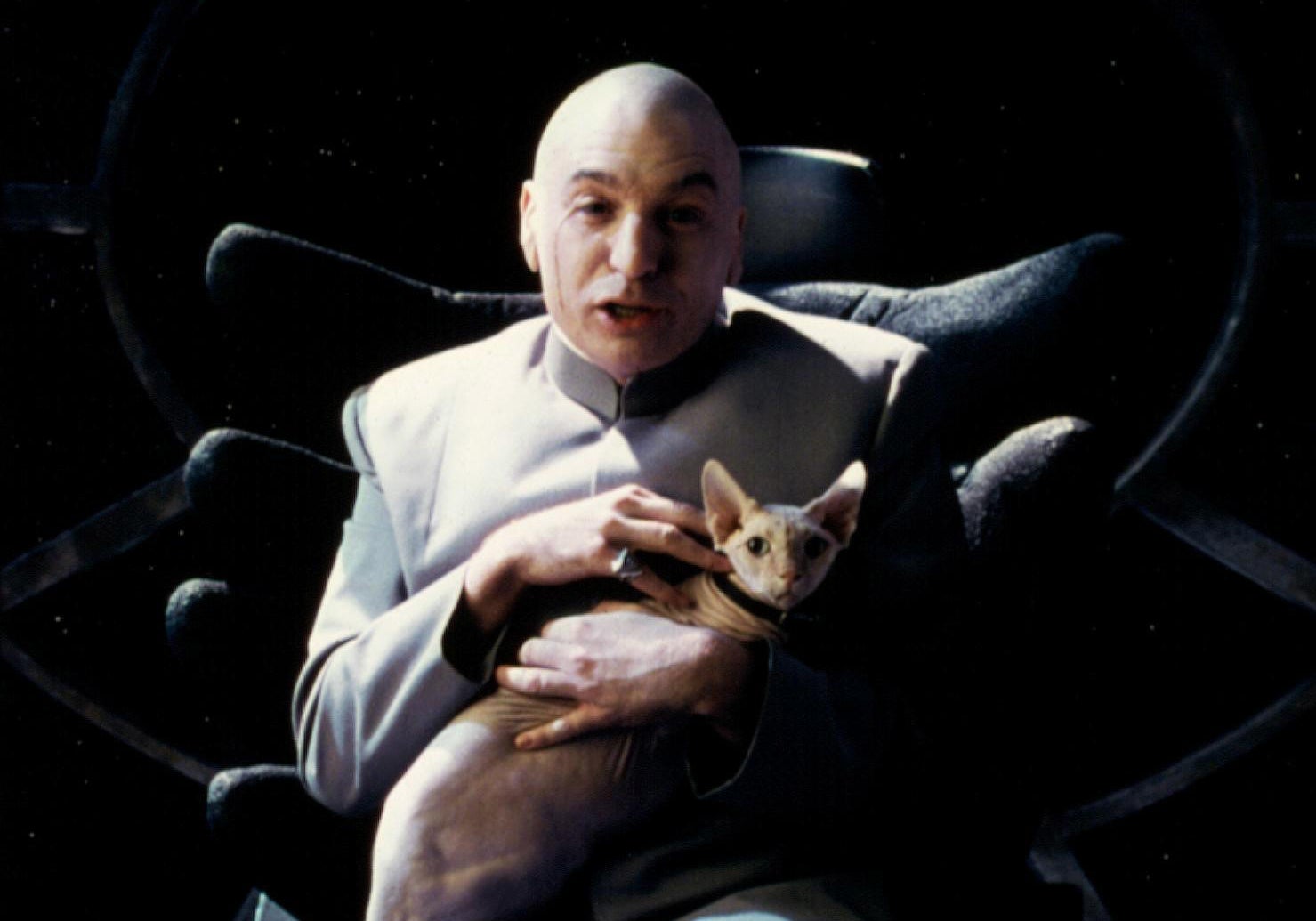 Mike Myers as Dr. Evil in Austin Powers holding a hairless cat