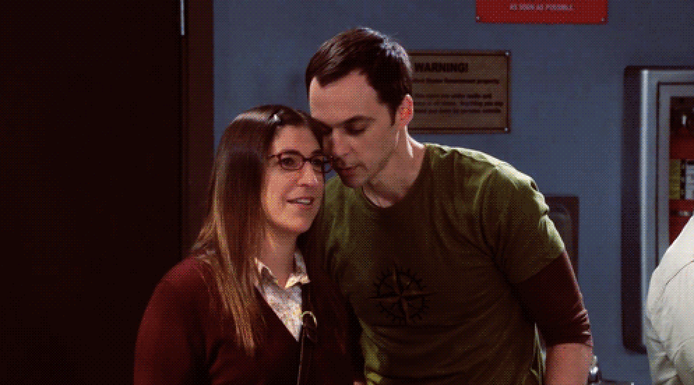 Sheldon and Amy semi-cuddling on the big bag theory