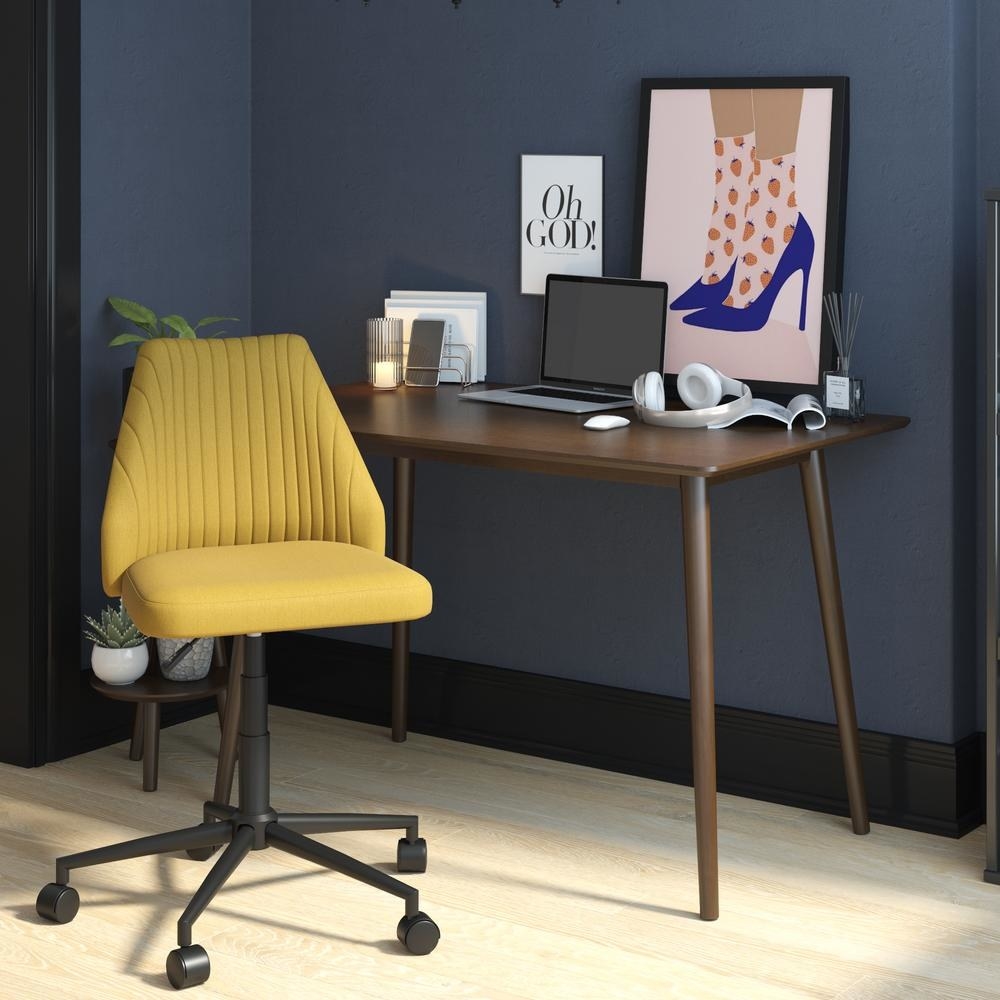 swivel desk chair in mustard color 