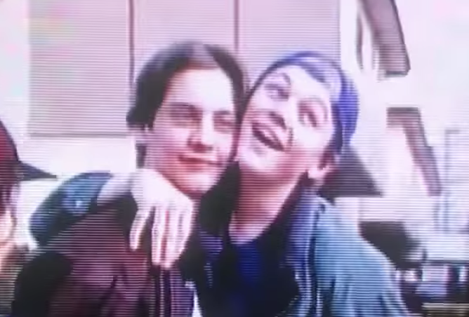 young Leo posing with a young Tobey