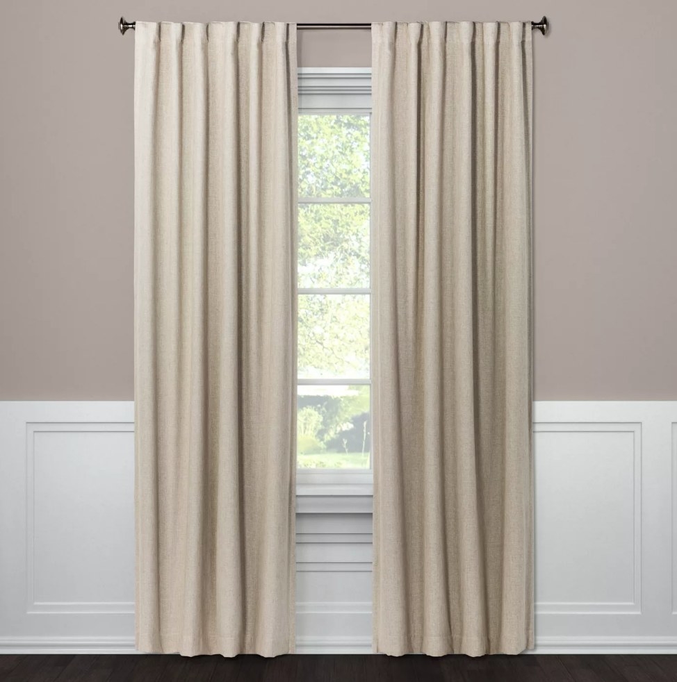 Light brown linen blackout curtains on window