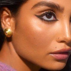 A model wearing black winged eyeliner 