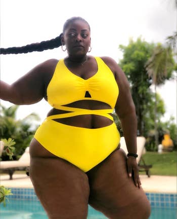 Reviewer wearing yellow swimsuit