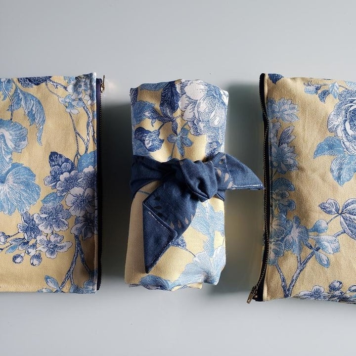 same organizer closed and tied prettily with floral blue print on display