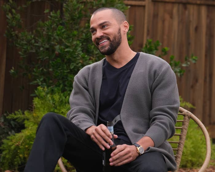 Jesse Williams sits back with a beer in Grey's Anatomy