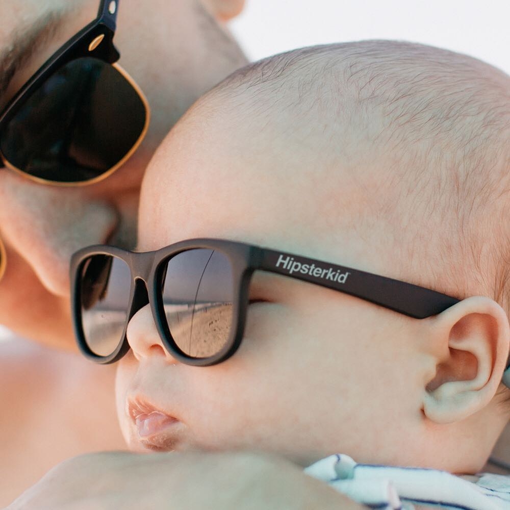 A baby wearing sunglasses
