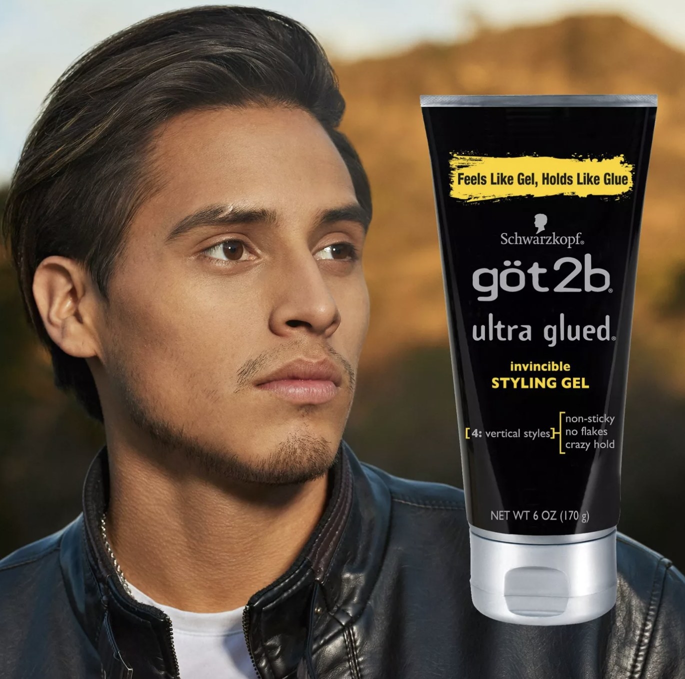 A man with a bottle of styling gel
