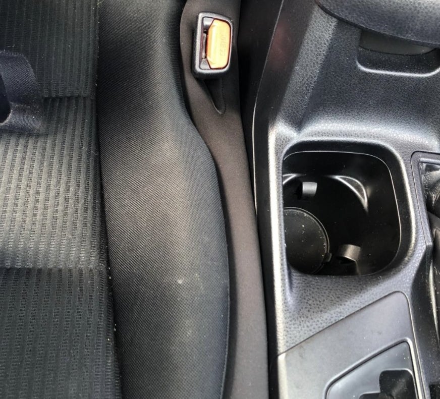 reviewer photo showing the seat gap blocker installed in their vehicle 