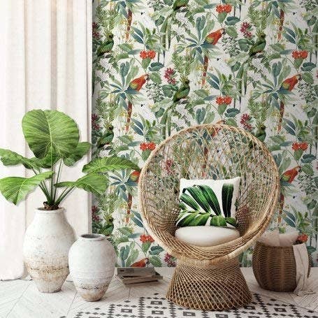 A wallpaper with repetitive patterns of tropical birds surrounded by greenery.