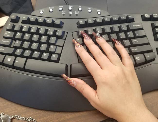 a reviewer using the split keyboard