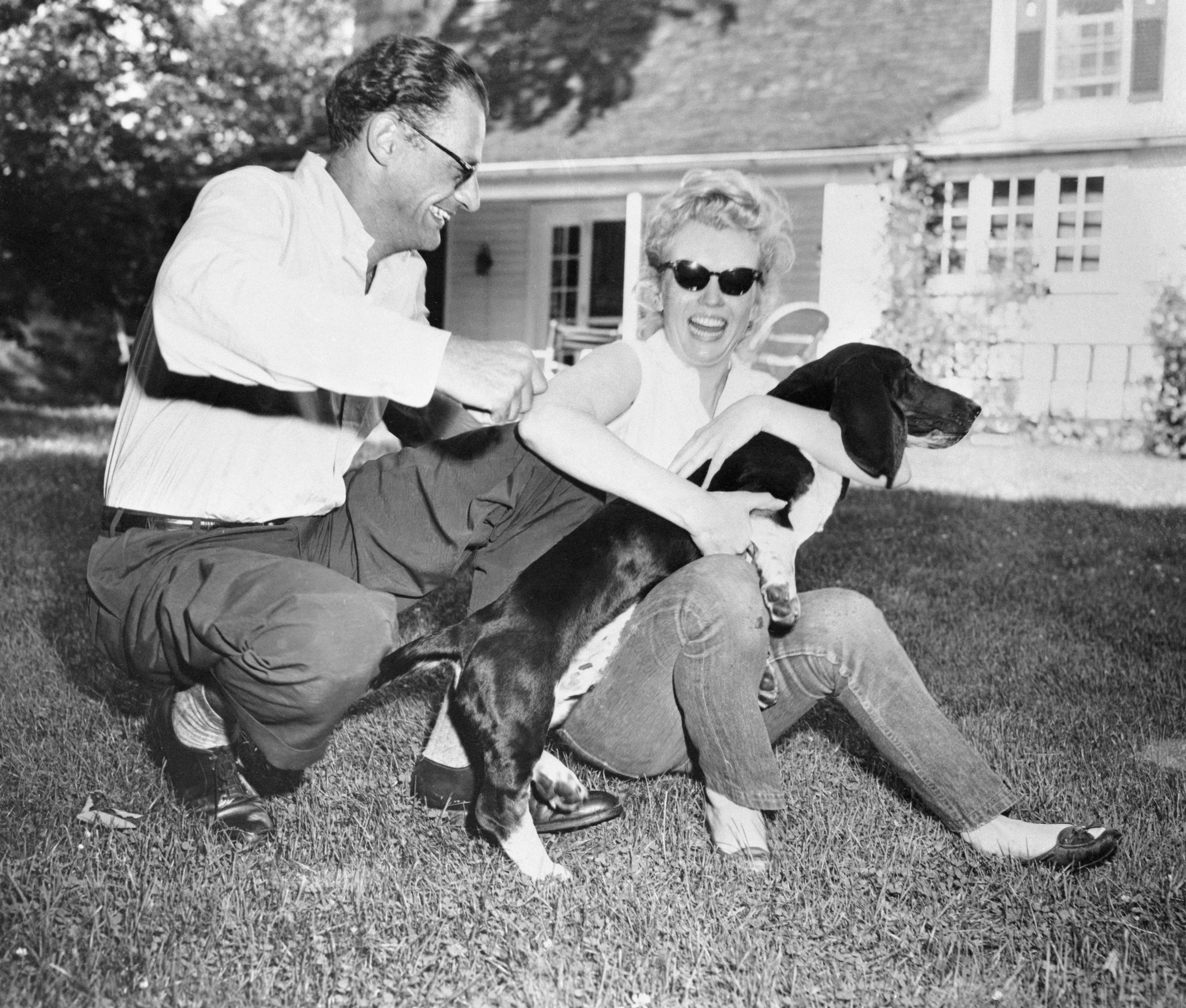 Marilyn Monroe with her soon-to-be husband Arthur Miller and his dog