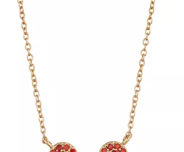 A rhinestone decorated necklace in Mickey&#x27;s hearthape with a heart cutout in the middle