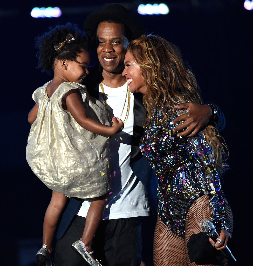 Blue Ivy Carter, Jay-Z, and Beyoncé onstage during the 2014 MTV Video Music Awards