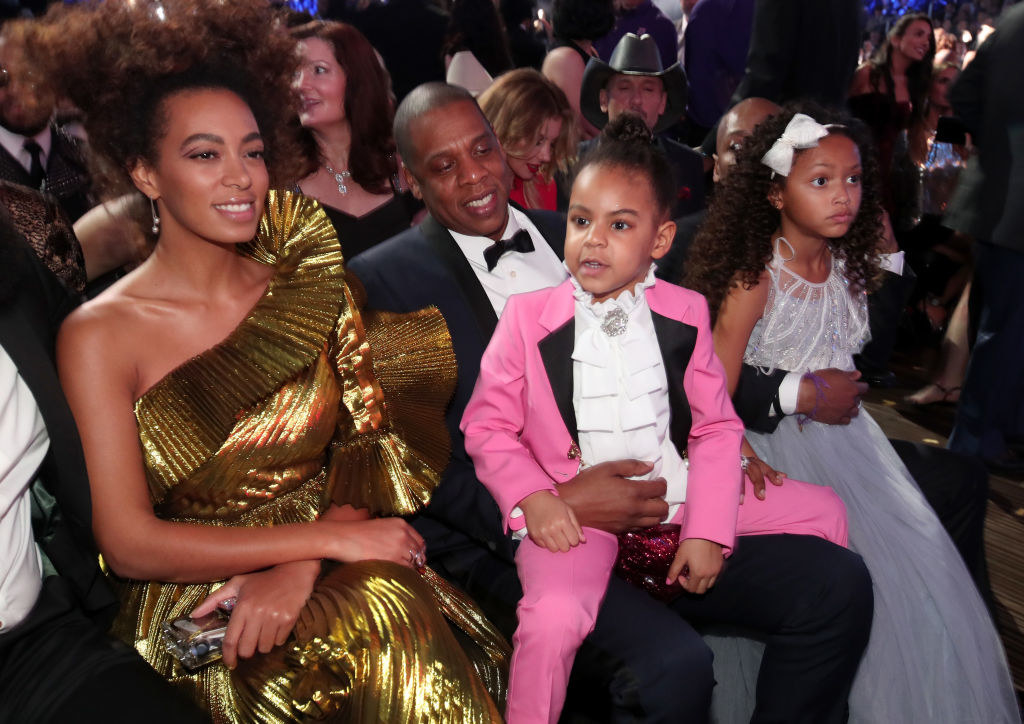  (L-R) Solange Knowles, Jay-Z, and daughter Blue Ivy Carter during The 59th Grammy Awards