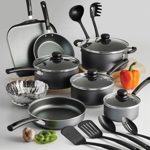 18-piece non-stick cookware set including sauce pans, frying pans, utensils, and lids