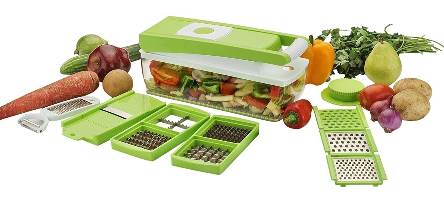 A vegetable chopper with different blades, vegetables and fruits 