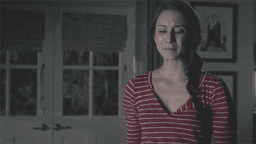 On &quot;Pretty Little Liars,&quot; Troian Bellisario cries and throws her phone on the ground