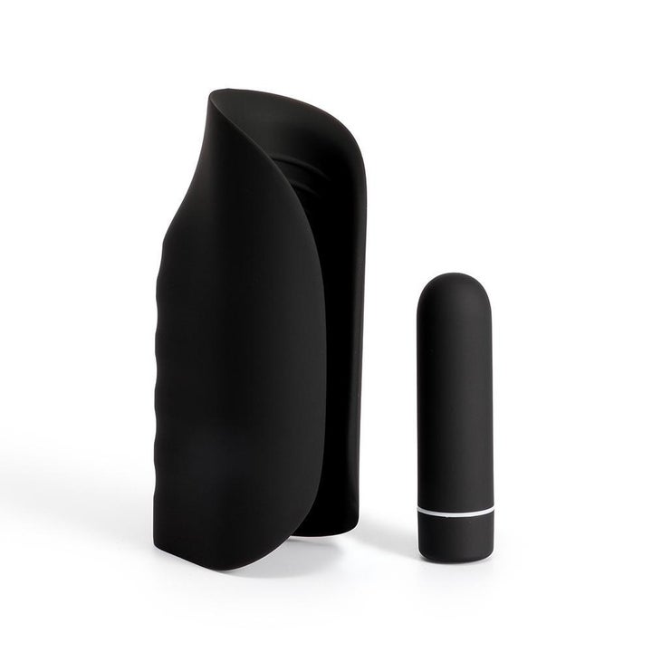 Black masturbation sleeve next to black removable bullet vibrator