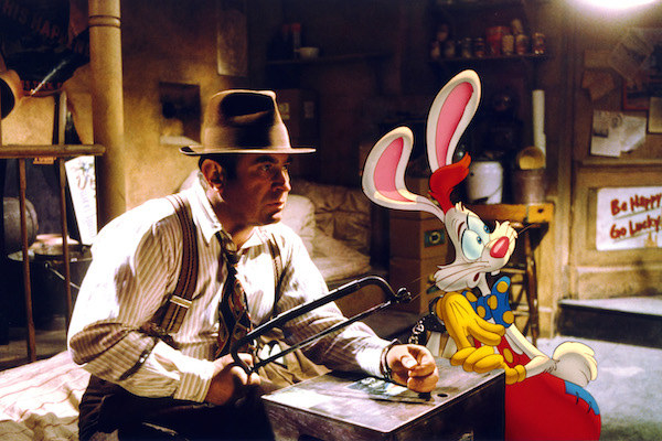 Bob Hoskins and Roger Rabbit (voiced by Charles Fleischer) trying to break out of handcuffs