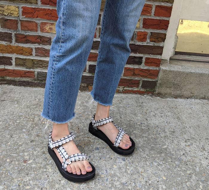 BuzzFeed editor wearing the black-and-white gingham sandals