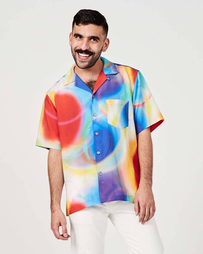 model in swirly-print short-sleeve button down shirt