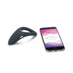 The ring next to cell phone with We-Vibe app