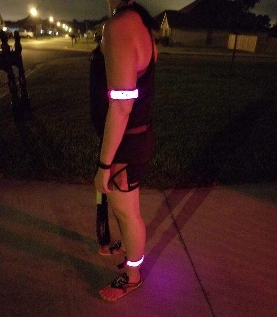 Reviewer wearing the glow in the dark bands while running at night