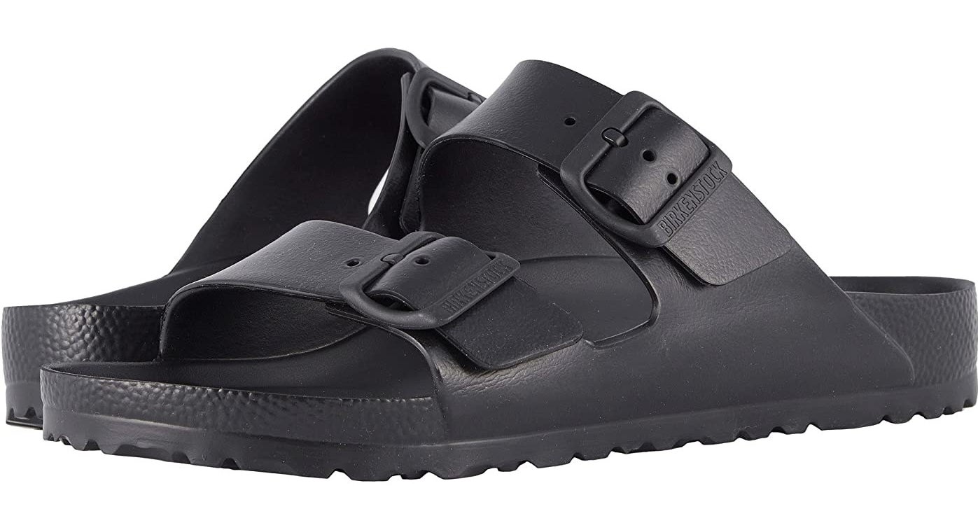 a pair of black waterproof birkenstocks